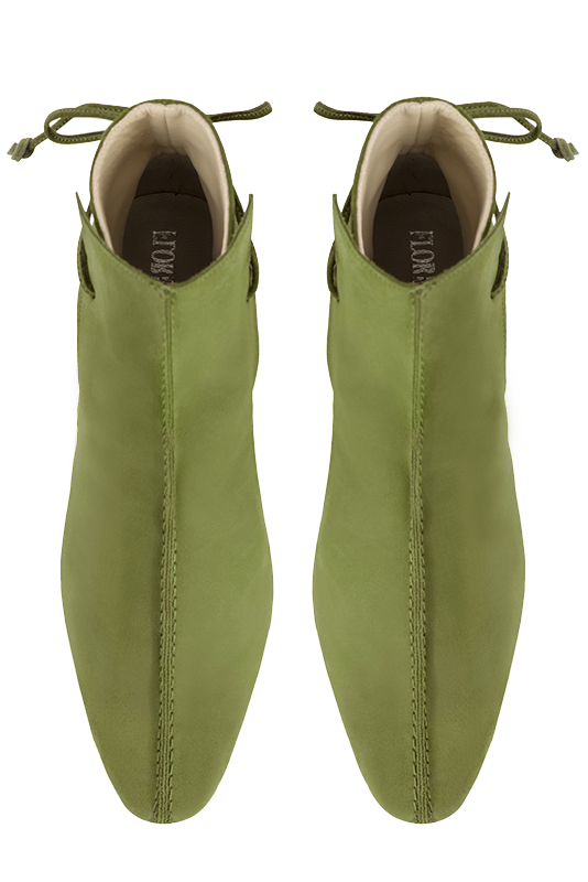 Pistachio green women's ankle boots with laces at the back. Round toe. Low block heels. Top view - Florence KOOIJMAN